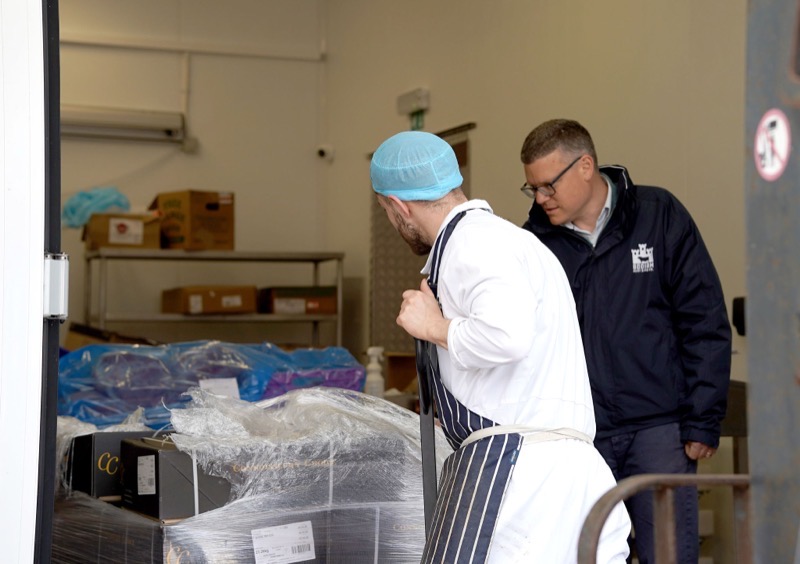 Bodiam Foods team reviewing the morning's food service pallet at the depot